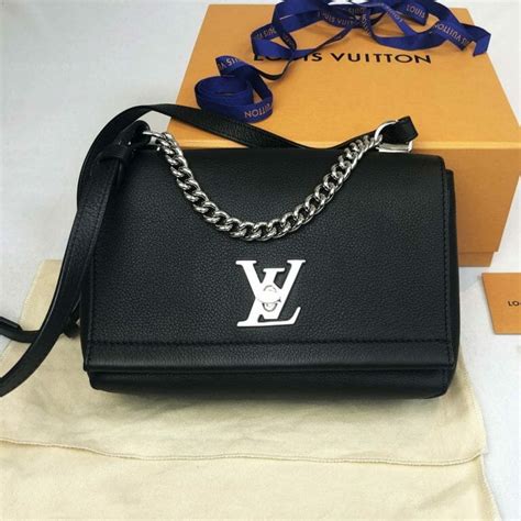 louis vuitton lock me handbags.